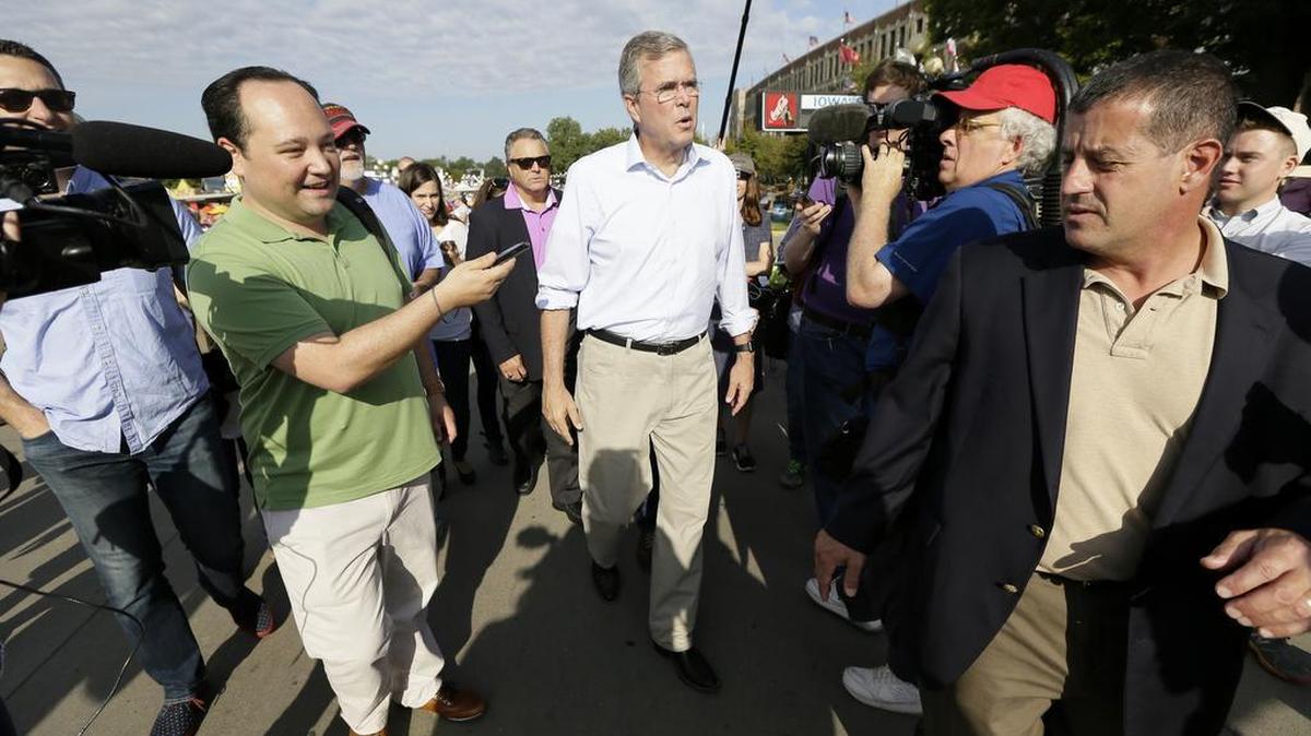
Republican presidential candidate former Florida Gov. Jeb Bush walks down the main concourse during a visit to the Iowa State Fair, Friday, Aug. 14, 2015, in Des Moines, Iowa.

