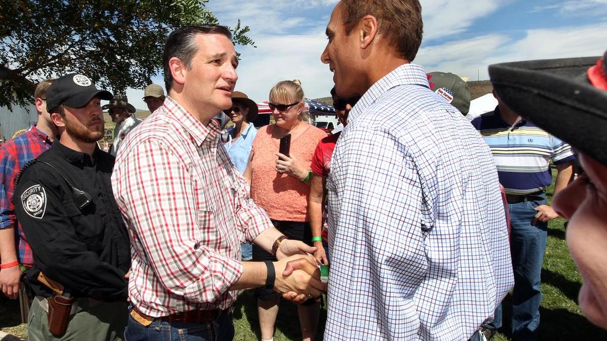 
Republican presidential candidate U.S. Sen. Ted Cruz is greeted by a supporter at the inaugural Basque Fry at Corley Ranch in Gardnerville, Nev., on Saturday, Aug. 15, 2015. 

