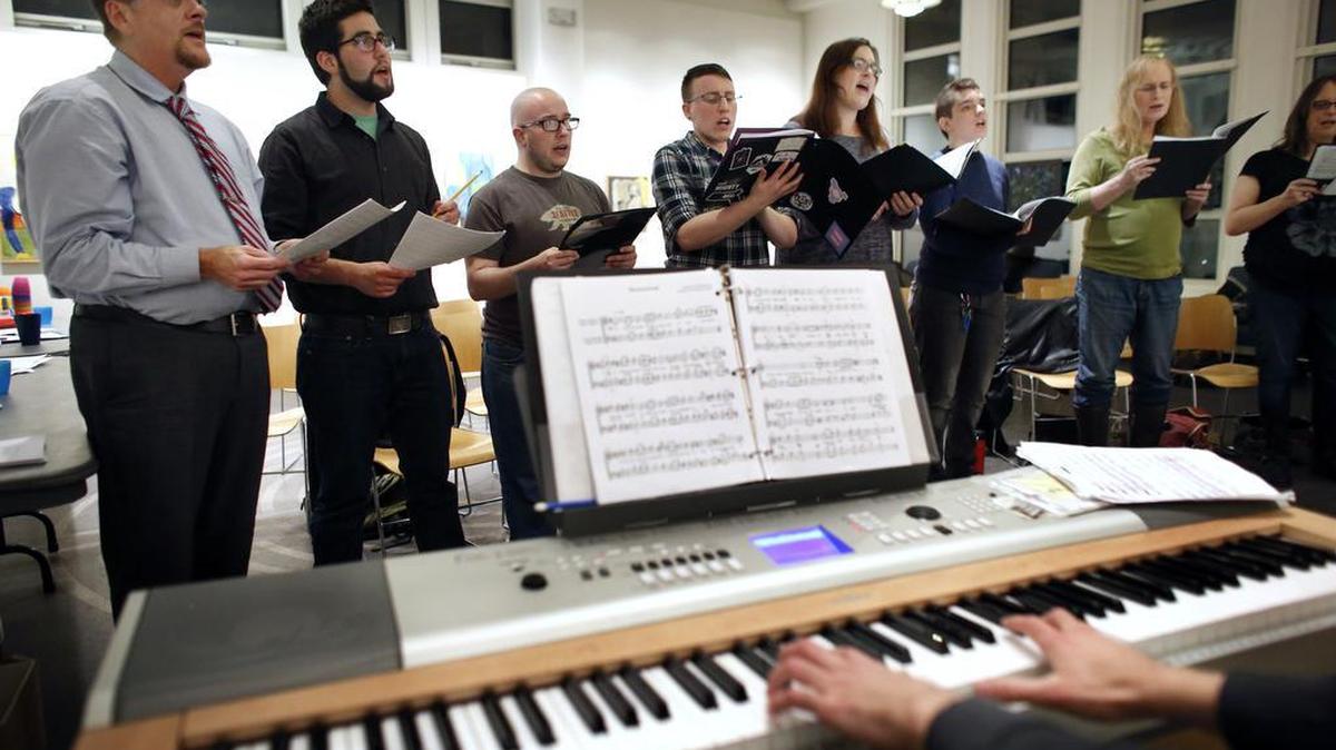 Members of the Butterfly Music Transgender Chorus sing during a rehearsal at a church in Cambridge, Mass. The chorus is led by Sandi Hammond, a vocal coach who also trains members how to adjust their voices safely when they transition.