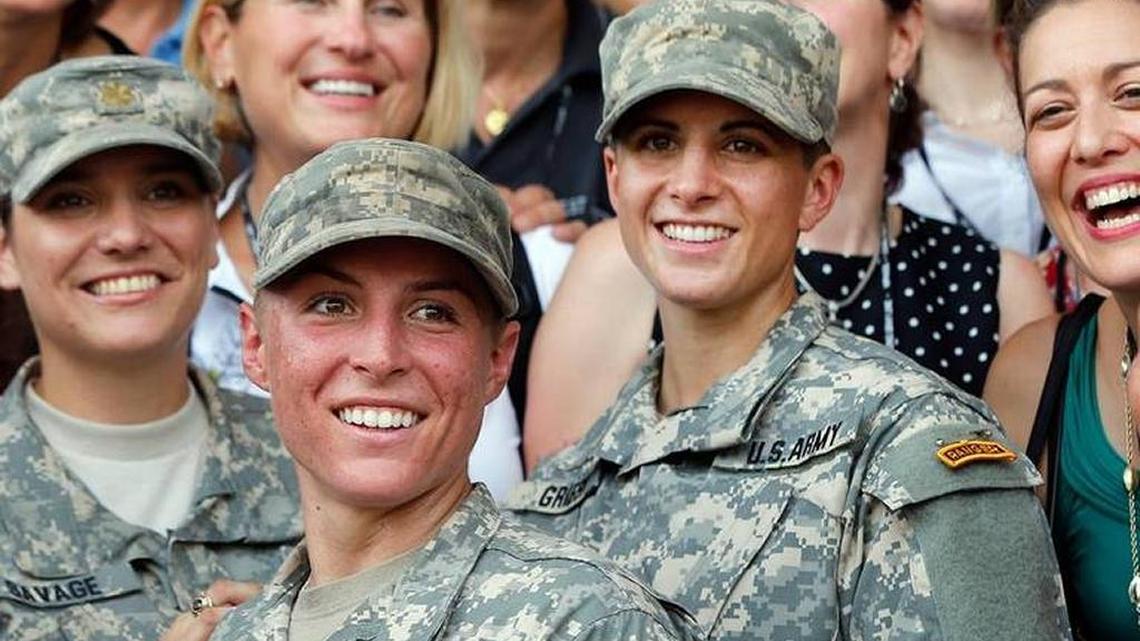 U.S. Army First Lt. Shaye Haver, front, and Capt. Kristen Griest, right, with other female West Point alumni after an Army Ranger school graduation ceremony, Aug. 21, 2015, at Fort Benning, Ga. More than 75 women West Point graduates gathered for the ceremony.

