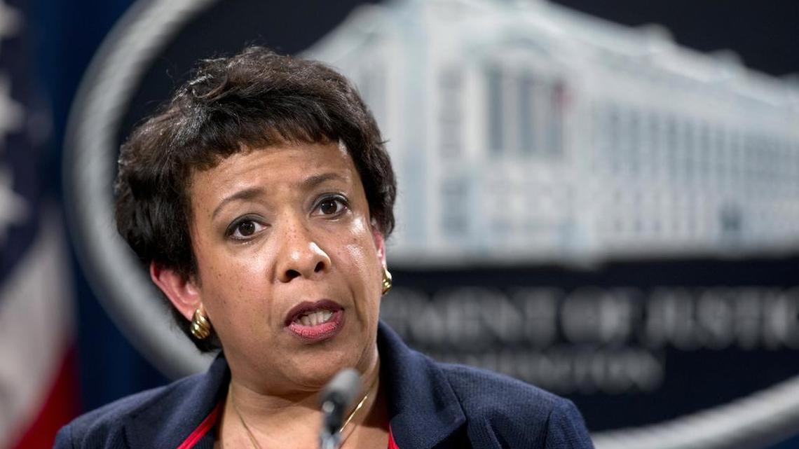 Attorney General Loretta Lynch speaks during a news conference at the Justice Department in Washington, Wednesday, Feb. 10, 2016, about Ferguson, Mo. The federal government sued Ferguson on Wednesday, one day after the city council voted to revise an agreement aimed at improving the way police and courts treat poor people and minorities in the St. Louis suburb.