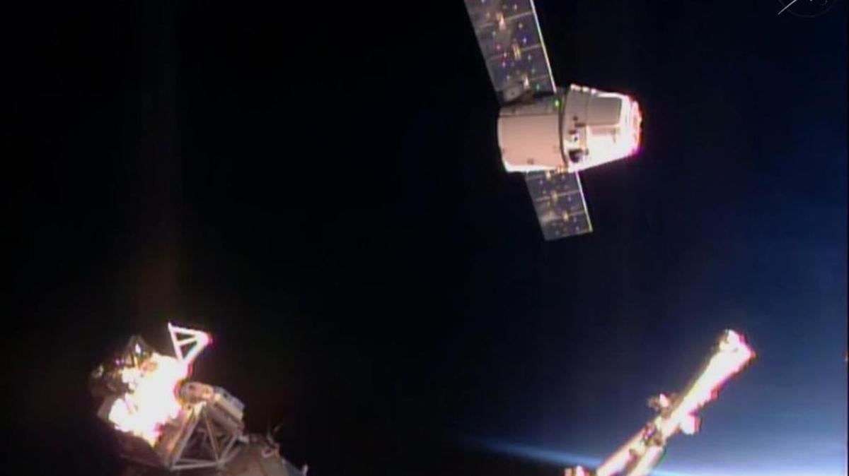 In this frame taken from video from NASA TV, the SpaceX Dragon cargo ship approaches the International Space Station on Sunday, April 10, 2016.