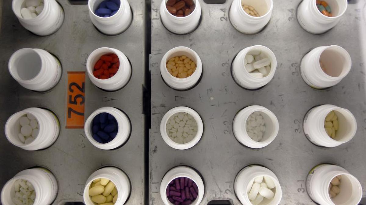 Prescription drugs are seen on the automated pharmacy assembly line at Medco Health Solutions in Willingboro, N.J., on June 14, 2011. Hospitals nationwide are trying strategies to counter rising drug costs.