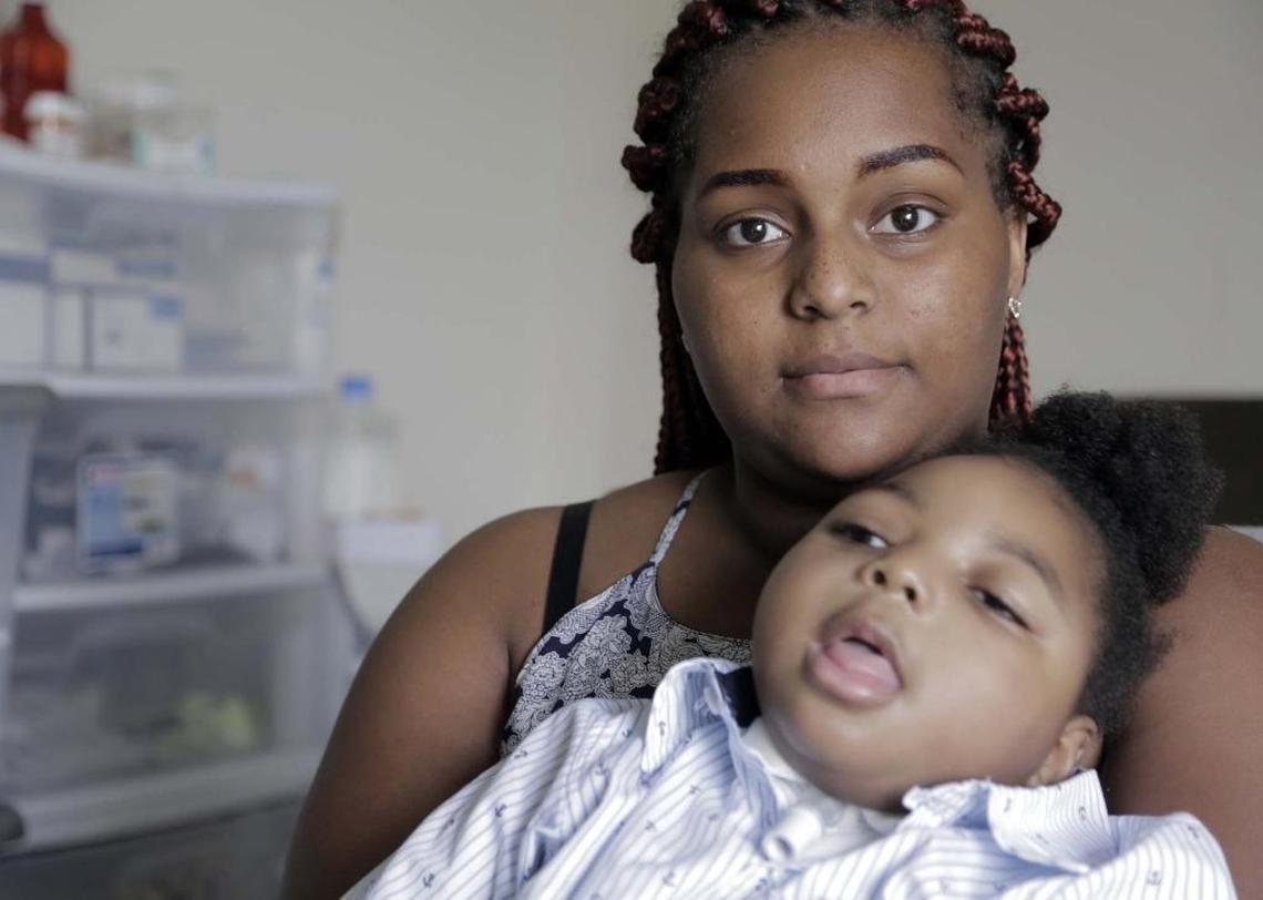 Miami, Florida, April 26, 2017- Marla Dixon with her 3 yr-old son EJ at their home in Miami Gardens. EJ was born with hypoxic ischemic-encephalopathy, a form of permanent brain damage. He will need a lifetime of round-the-clock medical care, including a nurse and future surgeries, and daily medications. In April, a federal judge ruled that the doctor who delivered EJ failed to offer or perform an emergency Cesarean section delivery, which may have prevented EJ’s brain damage. The doctor blamed Dixon and falsified her patient record to make it appear that she had refused.