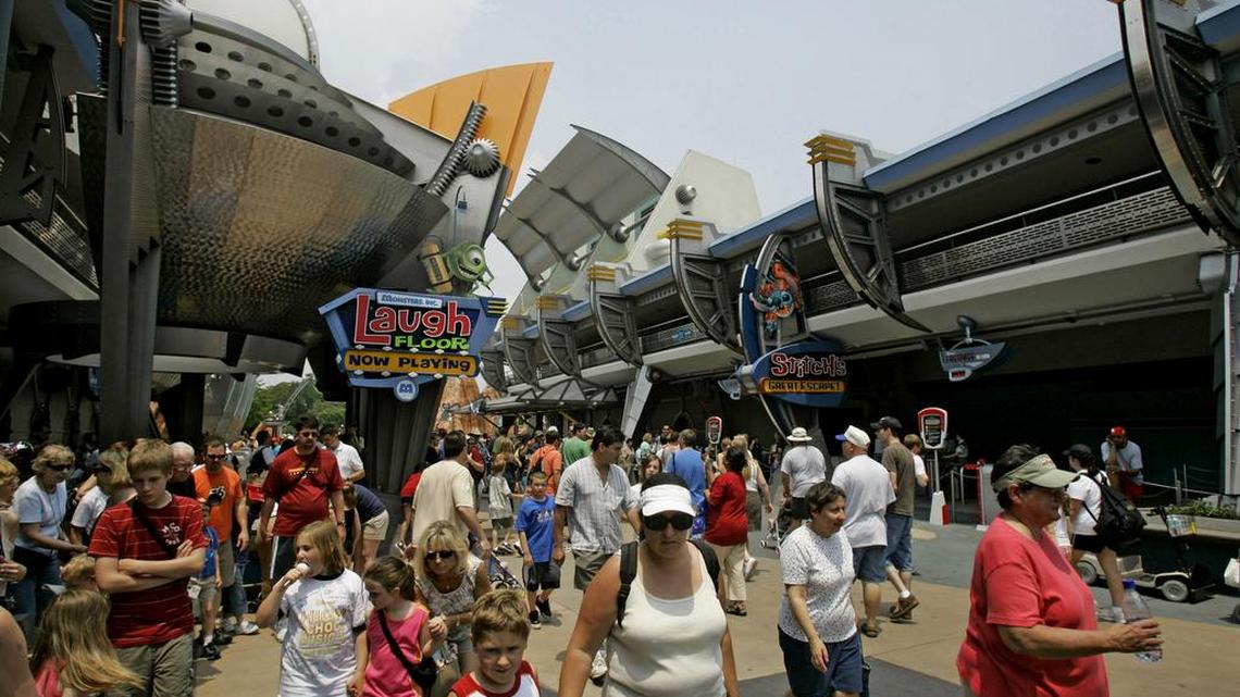 In this May 17, 2007 file photo, guests walk by the entrance to the "Monsters Inc." show at the Magic Kingdom theme park at Walt Disney World in Lake Buena Vista, Fla.