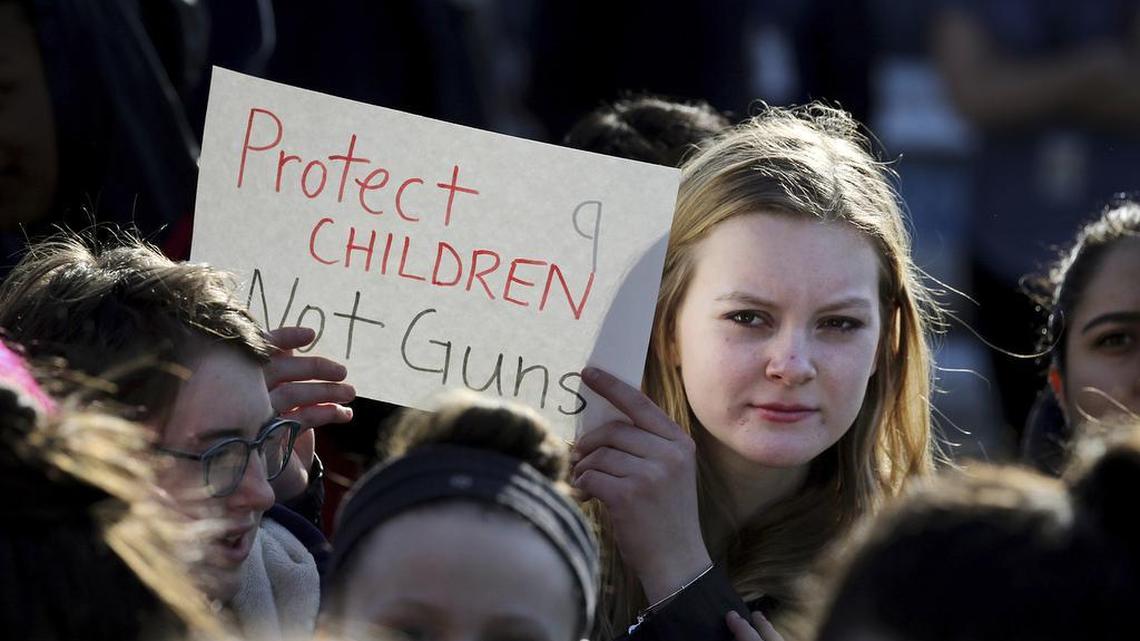 Somerville High School junior Megan Barnes marches with others during a Feb. 28 student walkout at the school in Somerville, Mass. A large-scale, coordinated demonstration is planned for Wednesday, March 14, when organizers have called for a 17-minute school walkout nationwide to protest gun violence.