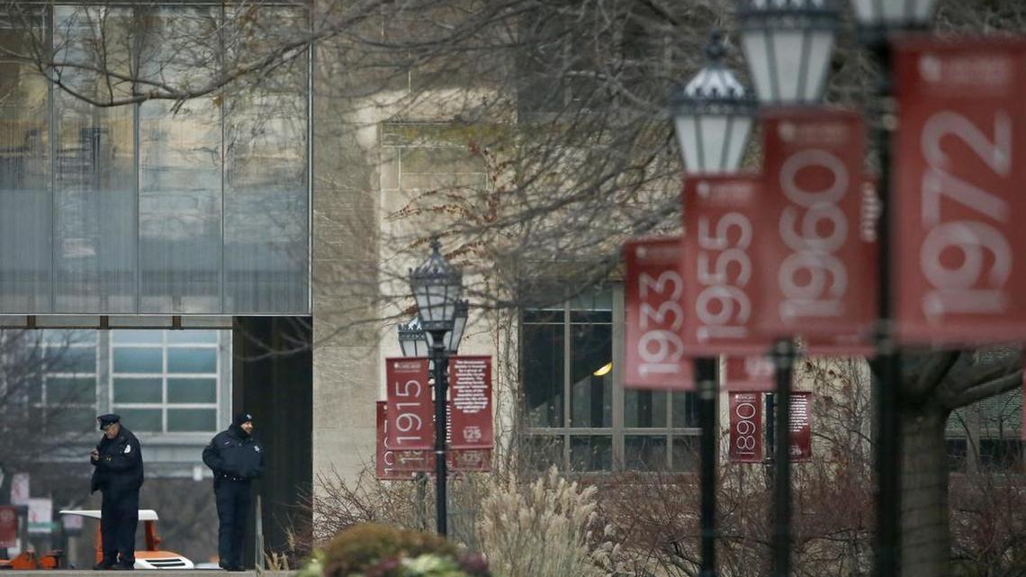 Campus security officers on the Main Quadrangles at the University of Chicago in Chicago on Monday, Nov. 30, 2015. The University of Chicago announced Sunday that all classes and other activities planned for Monday on its Hyde Park campus will be canceled after the university was informed by FBI counterterrorism officials of a gun violence threat to the campus.