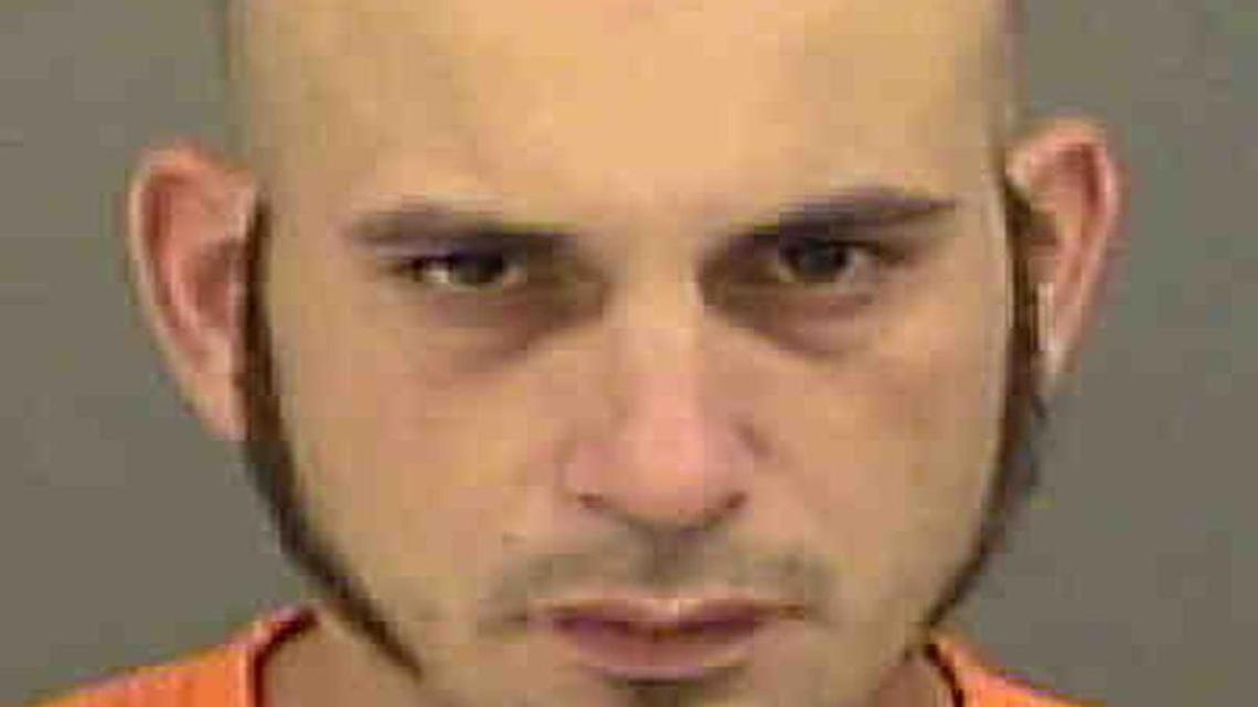 The FBI says Michael Kerr turned violent Thursday after his American Airlines flight landed in Charlotte.