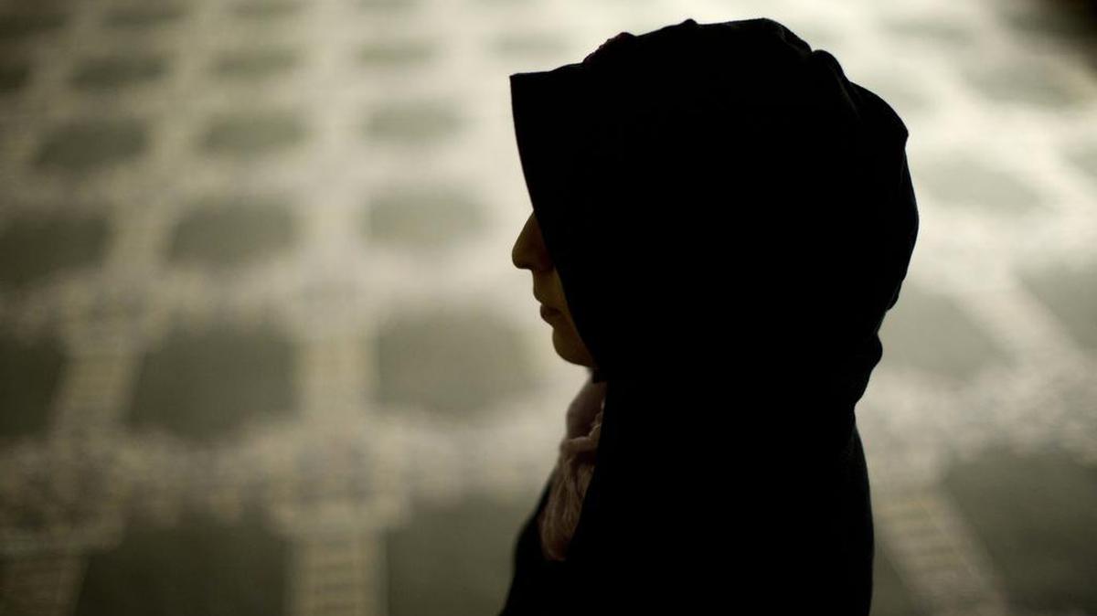 A Syrian refugee, who agreed to be photographed on condition of anonymity because of fear of retaliation against family living in Syria, poses for a portrait on Wednesday at the Muslim Association of Lehigh Valley in Whitehall, Pa. The House of Representatives passed a bill Thursday to impose heightened screening measures for Syrian and Iraqi refugees seeking to resettle in the U.S. Forty-seven Democrats voted for the bill.