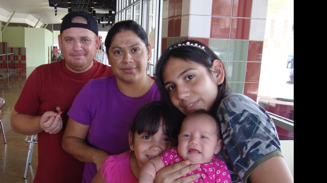 
Hiram Ramirez, 28, second from left, was denied a birth certificate for her newborn daughter, Dulce, in McAllen, Texas. She is seen with her husband, Eduardo Mendo, 41, and daughters Alejandra Mendo, 3, and Esli Mendo, 14.

