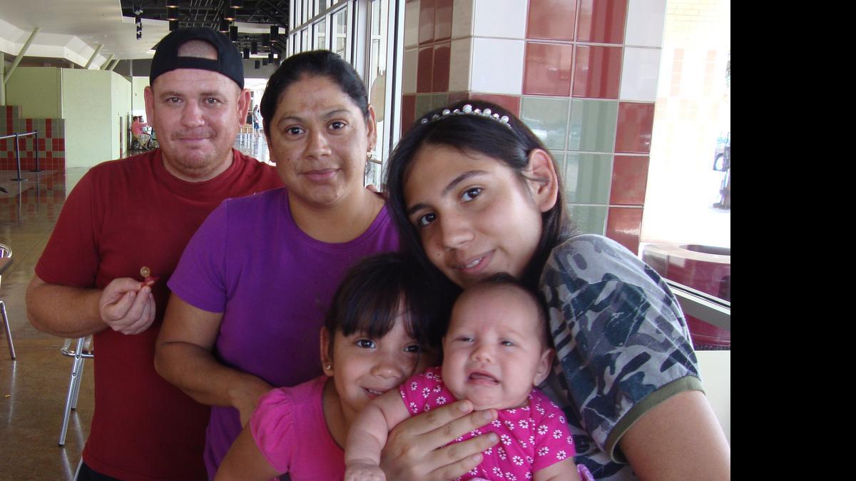 
Hiram Ramirez, 28, second from left, was denied a birth certificate for her newborn daughter, Dulce, in McAllen, Texas. She is seen with her husband, Eduardo Mendo, 41, and daughters Alejandra Mendo, 3, and Esli Mendo, 14.
