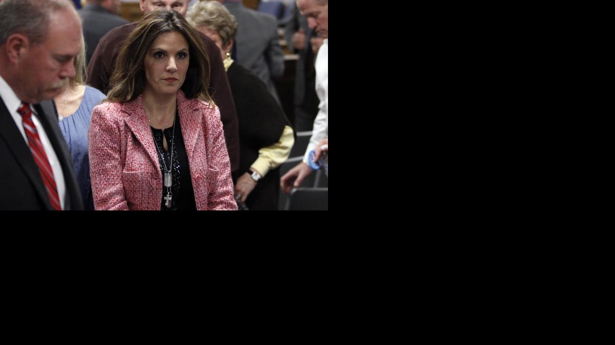 
Taya Kyle, widow of former Navy Seal Chris Kyle, leaves the courtroom during a recess in the capital murder trial of former Marine Cpl. Eddie Ray Routh at the Erath County, Donald R. Jones Justice Center in Stephenville, Texas, Tuesday, Feb. 17, 2015. Routh, 27, of Lancaster, is charged with the 2013 deaths of Chris Kyle and his friend Chad Littlefield at a shooting range near Glen Rose, Texas. 
