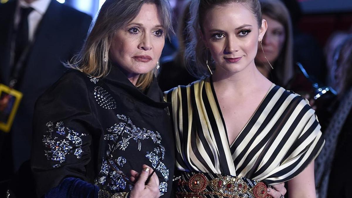 FILE- In this Dec. 14, 2015, file photo, Carrie Fisher, left, and daughter Billie Lourd arrive at the world premiere of "Star Wars: The Force Awakens" at the TCL Chinese Theatre in Los Angeles. Lourd says the support she’s received since the death of her mother and her grandmother, Debbie Reynolds, has given her strength.
