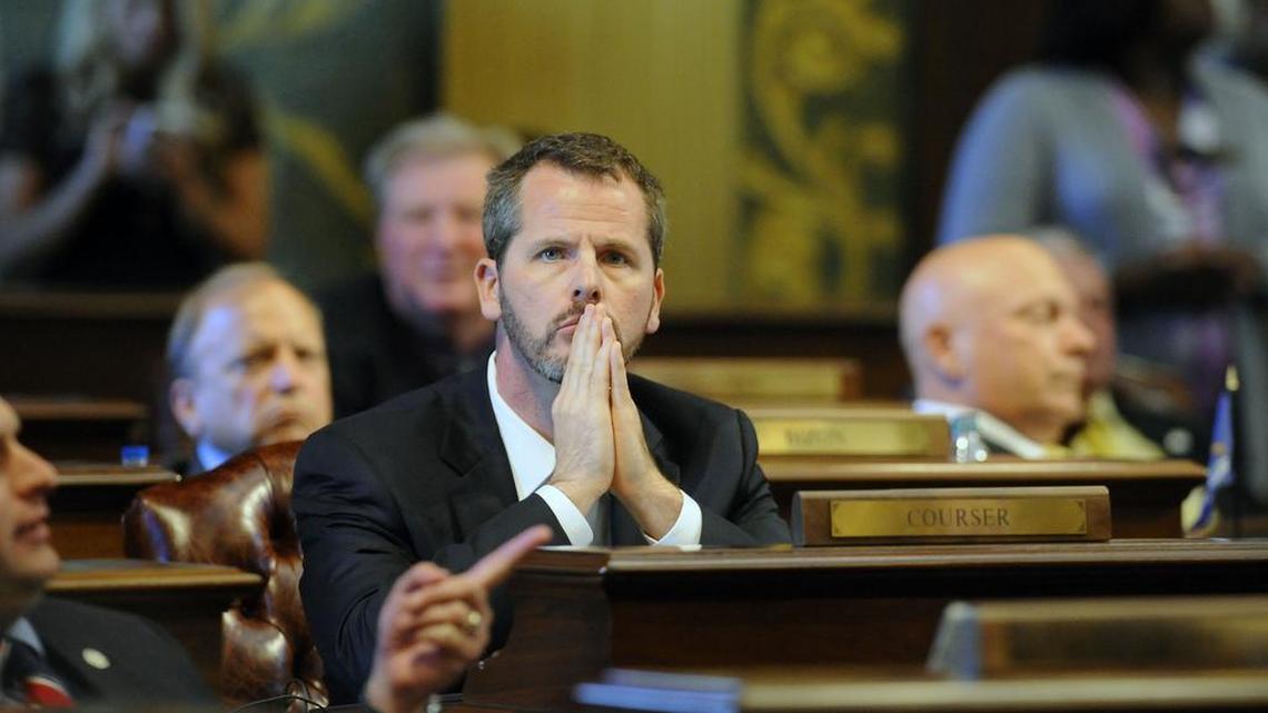 
Michigan State Rep. Todd Courser watches as votes roll in on his proposed expulsion from the legislature. Courser later resigned his seat after lawmakers remained deadlocked following hours of debate. Courser and Rep. Cindy Gamrat , both social conservatives, admitted to misconduct in covering up their extramarital affair.
