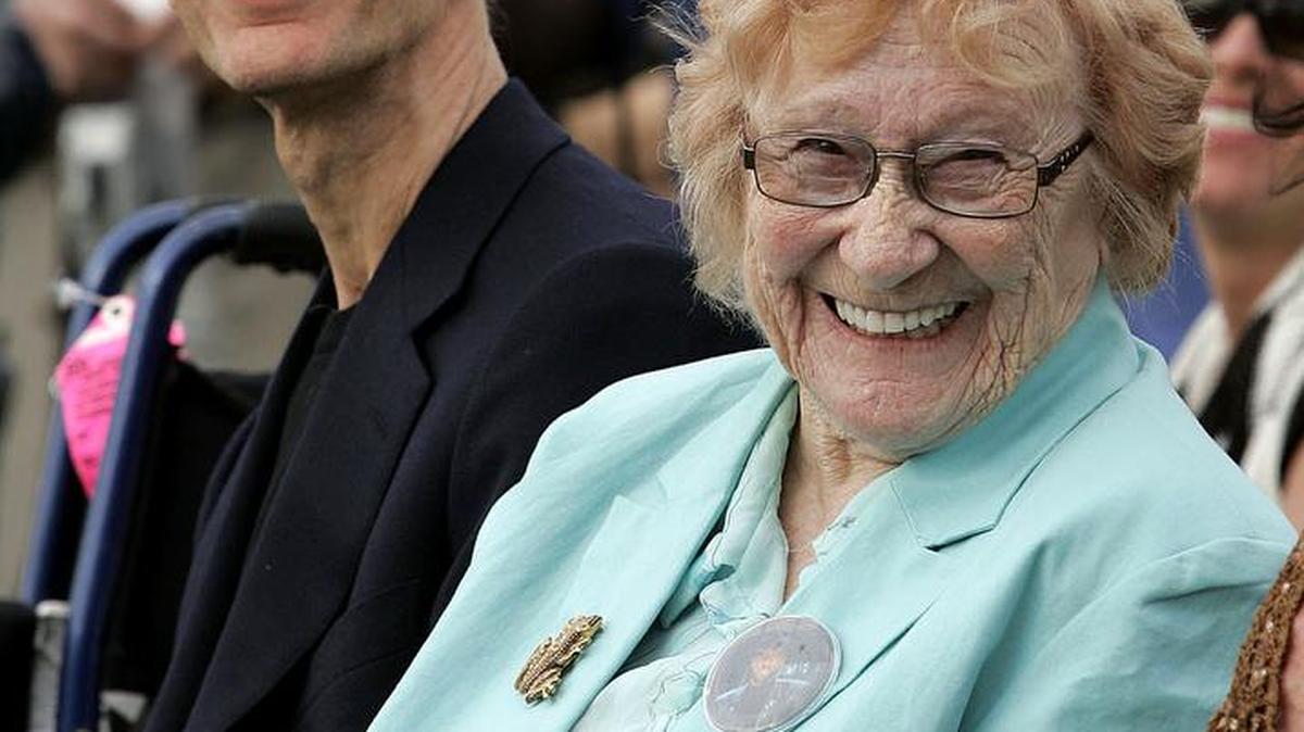 Barbara Gibb smiles while sits next to her son Robin of the Bee Gees during a park dedication ceremony to honor her late son Maurice Gibb in Miami Beach, Fla., March 4, 2007.