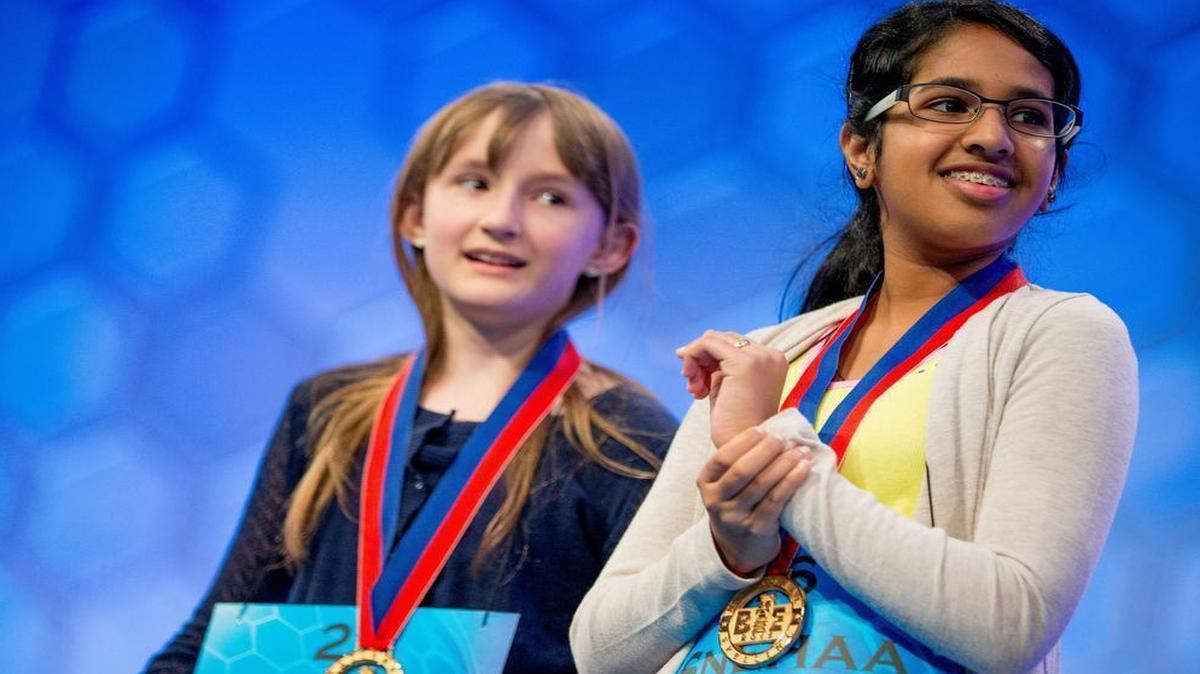 
Sylvie Lamontagne, 12, of Denver, left, and Snehaa Ganesh Kumar, 12, of Sacramento, Calif., advance to the finals of the 2015 Scripps National Spelling Bee, Thursday, May 28, 2015, in Oxon Hill, Md. 
