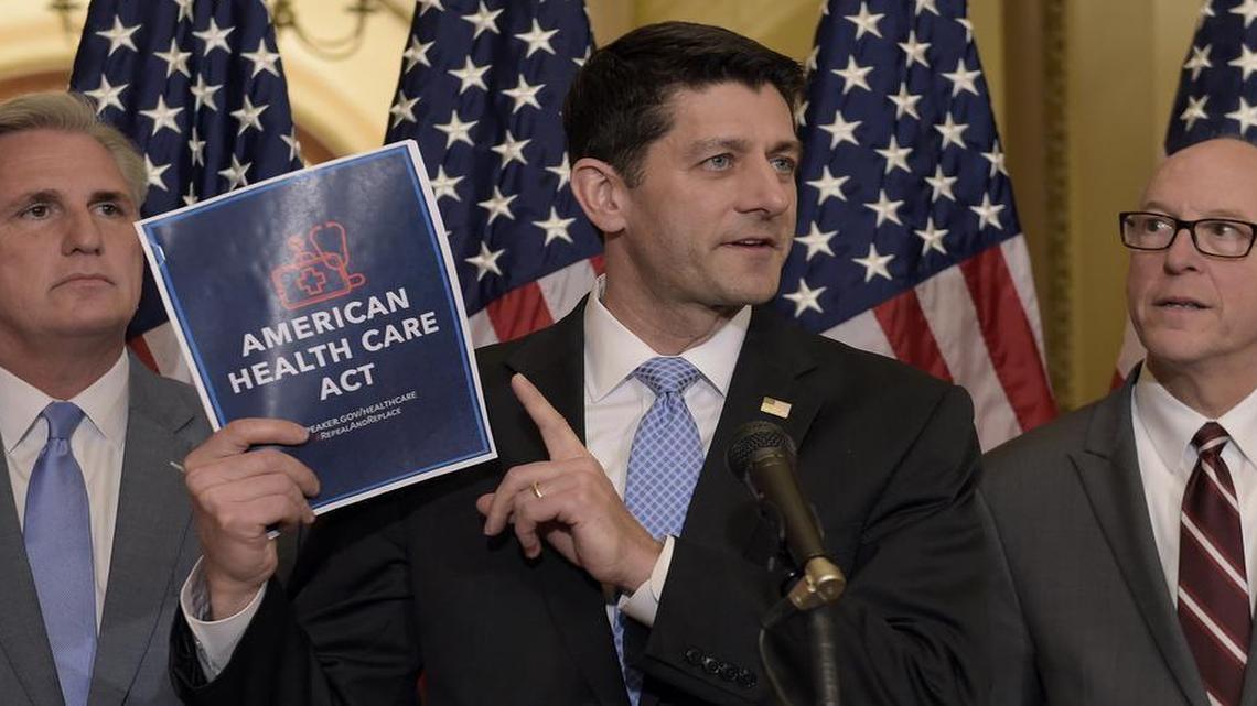 House Speaker Paul Ryan of Wis., center, standing with Energy and Commerce Committee Chairman Greg Walden, R-Ore., right, and House Majority Whip Kevin McCarthy, R-Calif., left, speaks during a news conference on the American Health Care Act on Capitol Hill in Washington, Tuesday, March 7, 2017.
