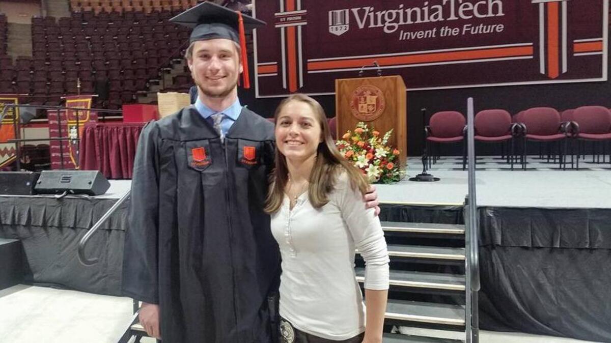 Virginia Tech engineering graduate Michael Senoyuit IV and Virginia Tech Police sergeant Kendrah Cline