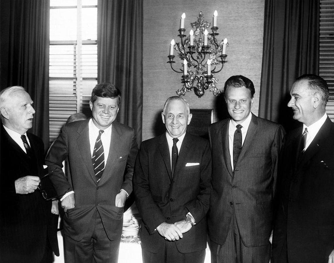 At a 1961 prayer breakfast sponsored by the International Council for Christian Leadership, in Washington’s Mayflower Hotel: From left, Judge Boyd Leedom; President John F. Kennedy; co-chair of the breakfast, Sen. Frank Carlson of Kansas; the Reverend Billy Graham; and Vice President Lyndon B. Johnson.