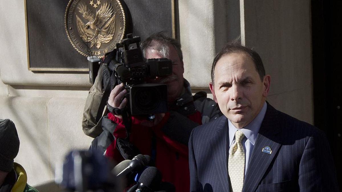 Veteran Affairs Secretary Robert McDonald speaks to reporters outside VA Headquarters in Washington on Feb. 24, 2015. More than one-third of calls to a suicide hotline for troubled veterans are not being answered by front-line staffers because of poor work habits and other problems at the Department of Veterans Affairs, an official says.