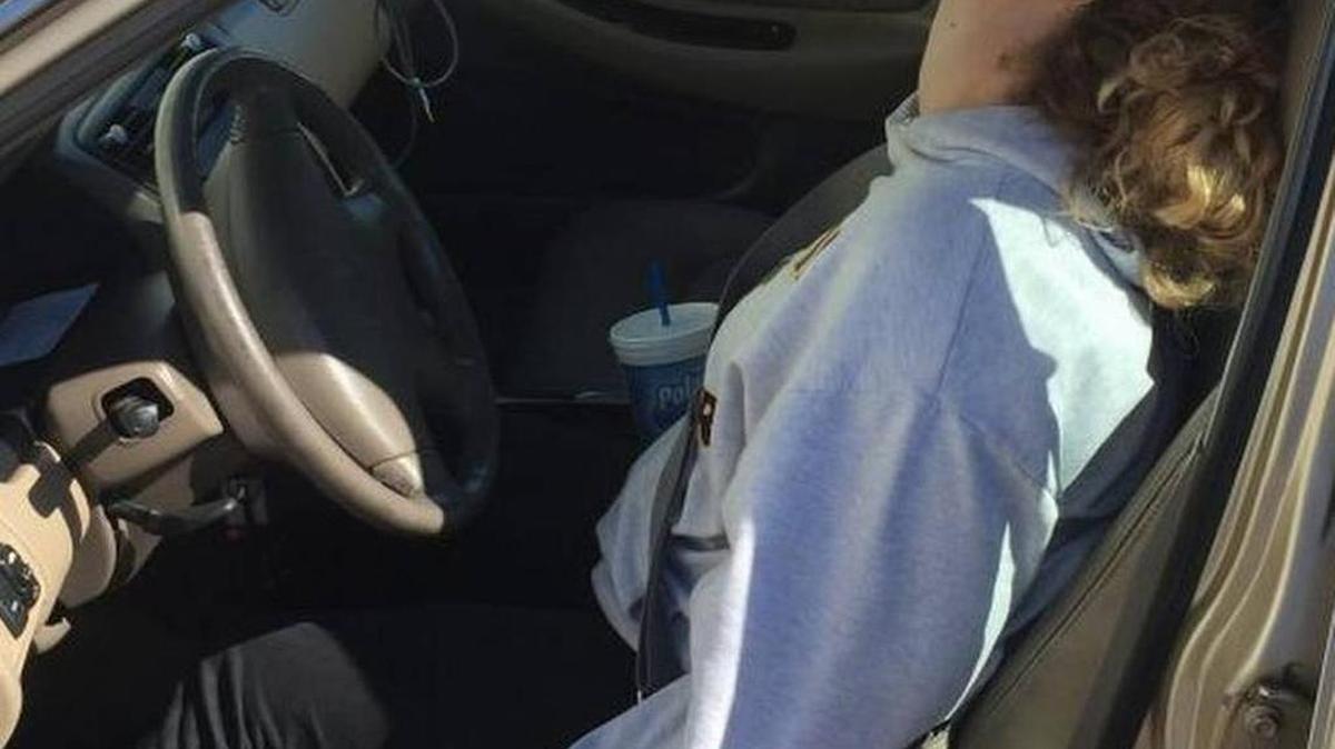 Police say this woman was found unconscious with a needle still in her hand in a parked vehicle while her 10-month-old son cried in the backseat.