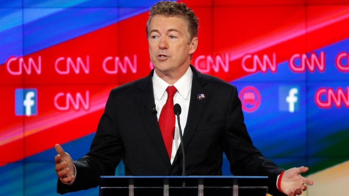 Rand Paul speaks during the CNN Republican presidential debate at the Venetian Hotel & Casino on Tuesday, Dec. 15, 2015, in Las Vegas. Paul is stepping up his criticism of Sen. Marco Rubio for skipping Senate votes to run for the White House.