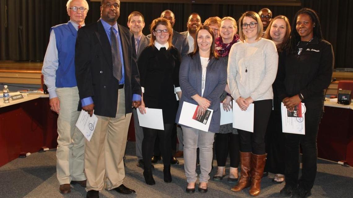 Southern Middle School faculty and staff, with Fayette County school board members and Superintendent Manny Caulk, were honored Monday night for supporting a seventh-grade shooting victim.