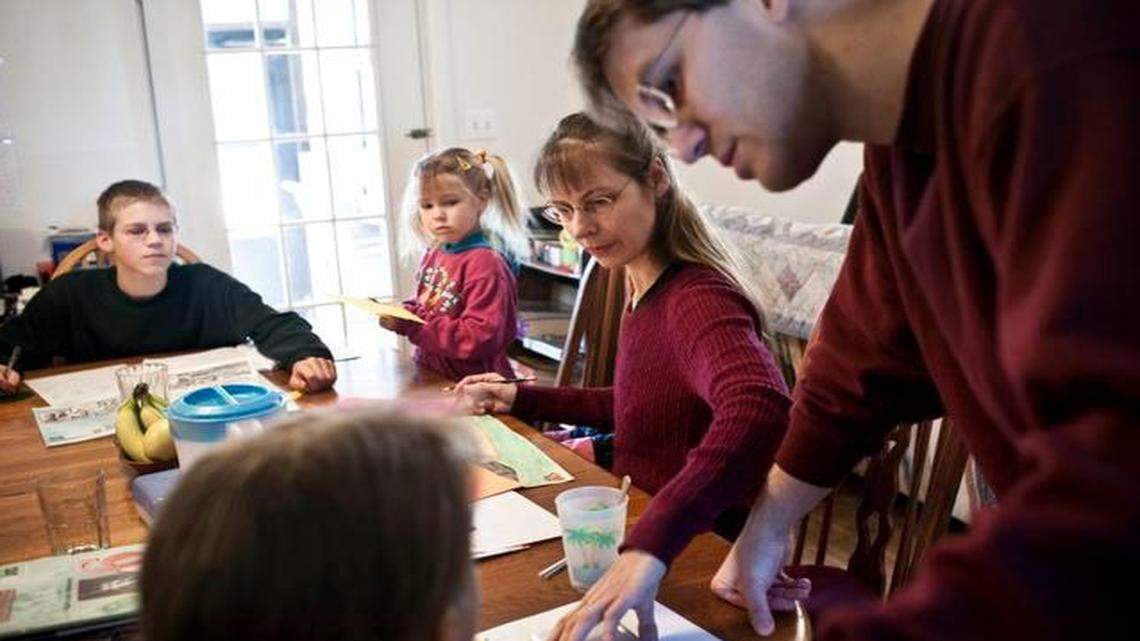 
Hannelore and Uwe Romeike (right and center) homeschool their children at their house in Morristown, Tenn., on Feb. 19, 2010. The Romeike family fled to Morristown from Germany in 2008 because they were facing fines for illegally homeschooling their children. They were granted asylum in the U.S. not long after this photo was taken.
