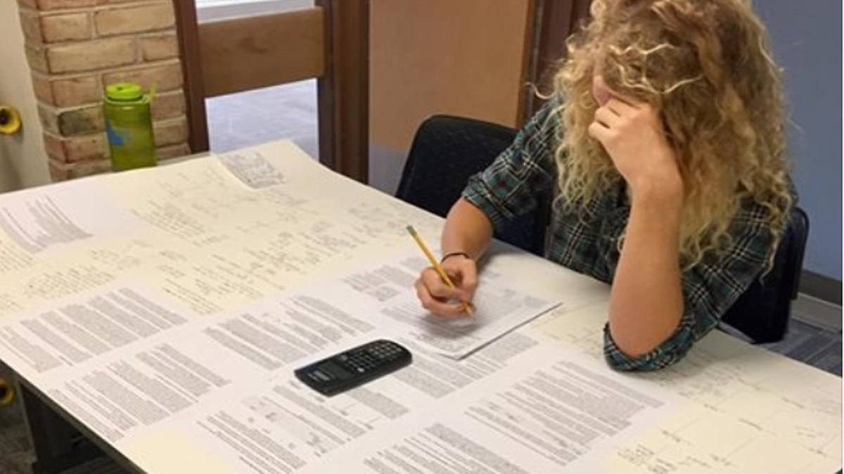 Accounting professor Reb Beatty says a student outwitted him Tuesday by bringing a 3x5 foot cheat sheet in for a test. Beatty ruefully notes on Facebook that he had failed to specify inches when he told students they could have a 3x5 notecard.