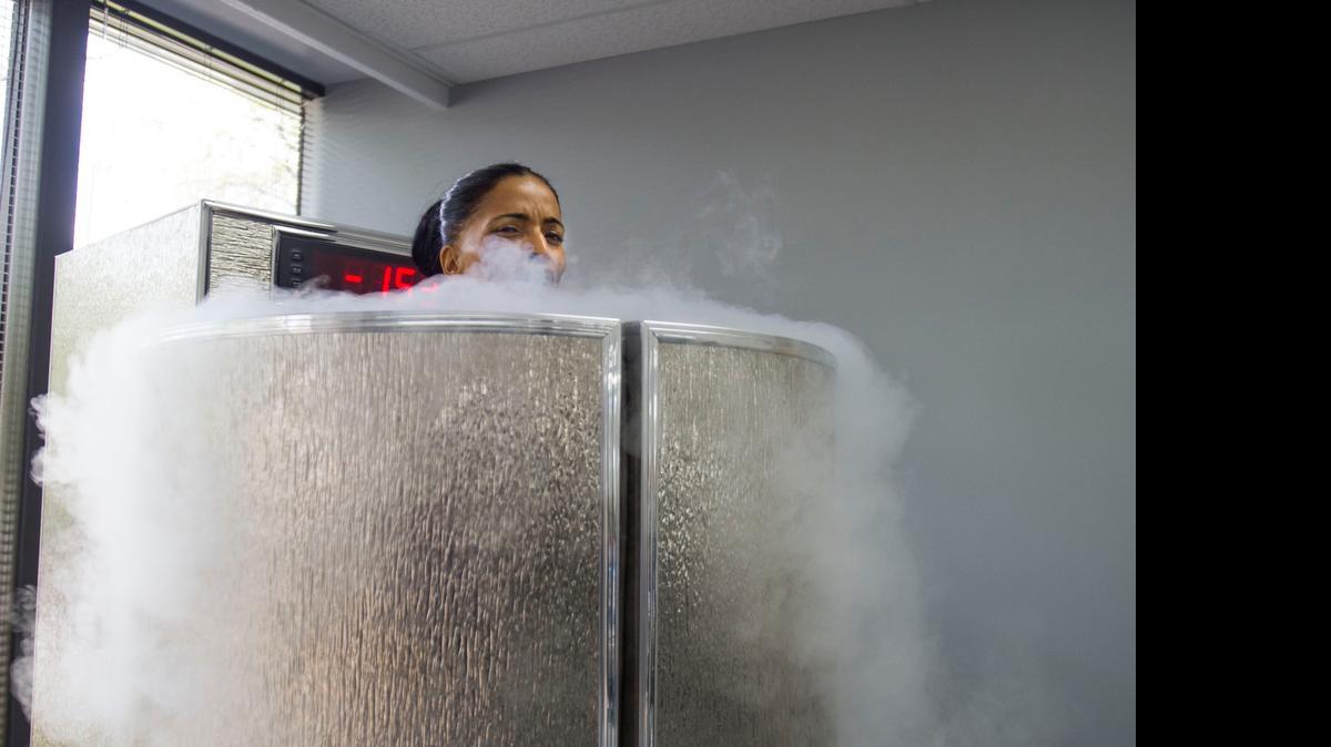 
Rachel Raman demonstrates the cryotherapy treatment offered at Cryobath during its May 15 opening in Sacramento.
