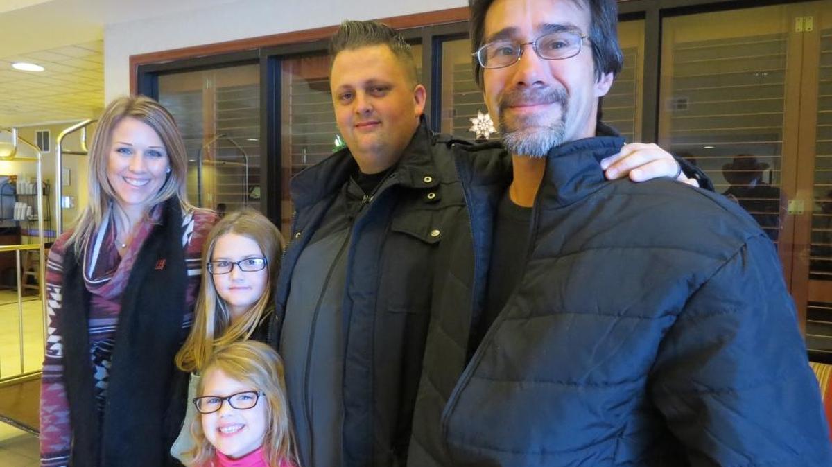 Annie and Adam Watters of Kennewick, and daughters Lola, 9, and Gwen, 6, and others have been helping Lance Purley, right, get back on his feet after he was living behind a strip mall.