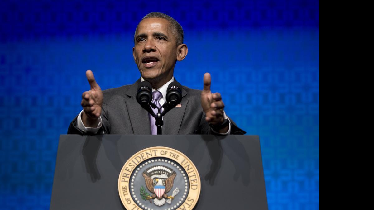 
President Barack Obama gestures as he speaks to the Catholic Hospital Association Conference at the Washington Marriott Wardman Park in Washington, Tuesday, June 9, 2015. 
