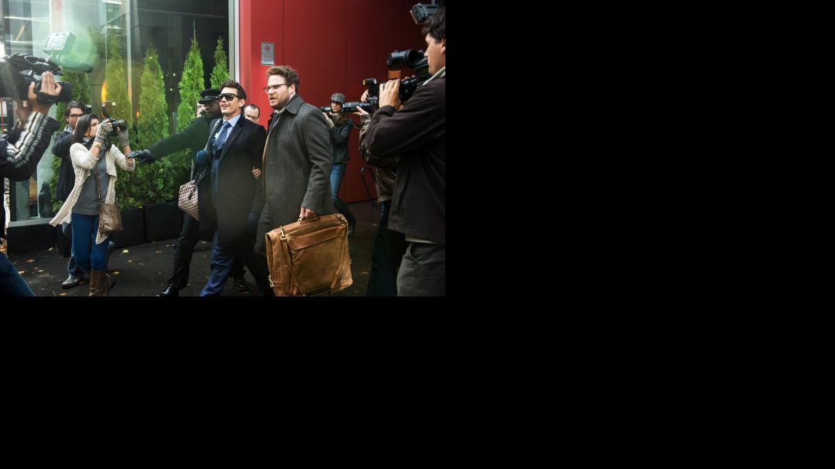 
This photo provided by Columbia Pictures – Sony shows, James Franco, center left, as Dave, and Seth Rogen as Aaron, in Columbia Pictures’ “The Interview.”
