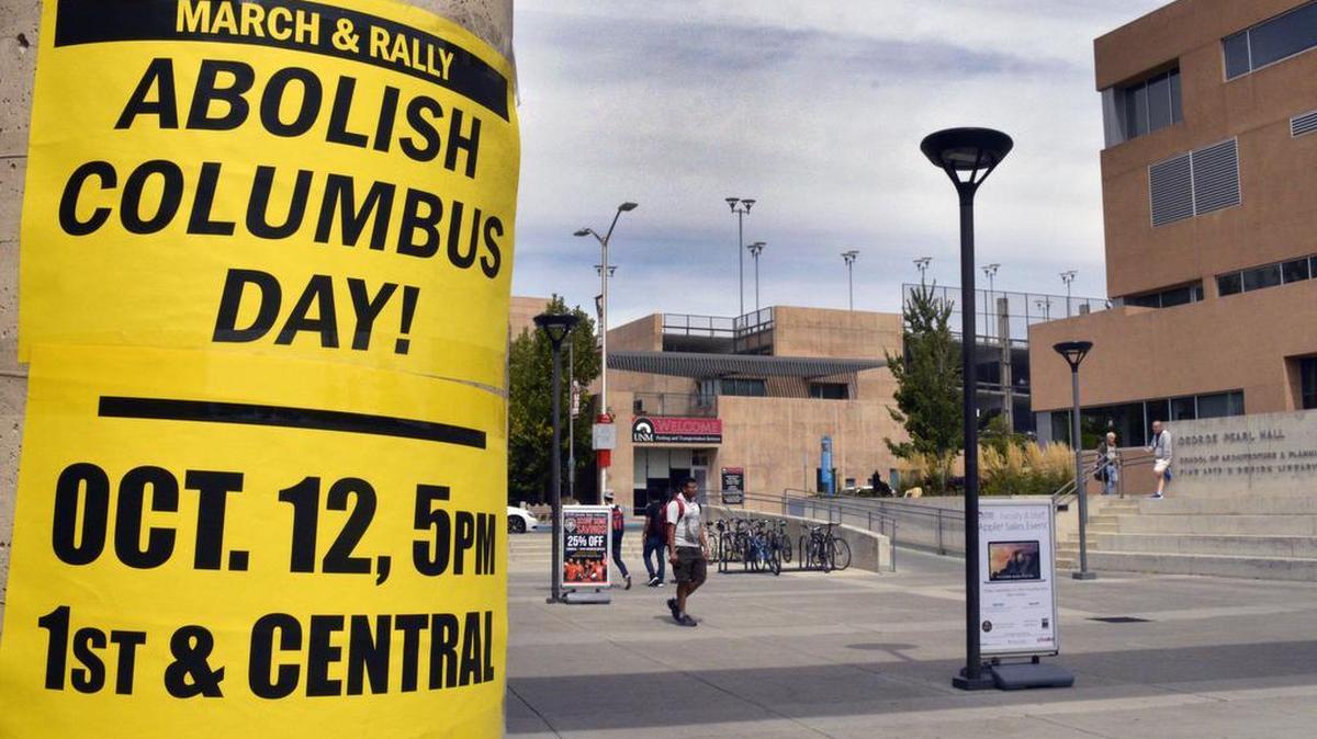 
In this Sept. 21, 2015, photo, a flyer on the campus of the University of New Mexico in Albuquerque calls for students to join a protest against Columbus Day. Monday, Oct. 12, 2015, marks the annual Columbus Day nationwide, but in a twist that signals a growing trend, it will also be Indigenous Peoples Day in at least nine U.S. cities this year. 
