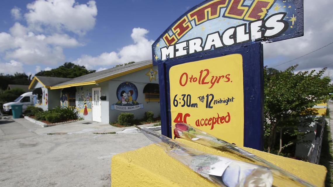 Flowers are pictured Tuesday, August 8, 2017, outside a day care center in Orlando, Florida, where a young boy was found dead after being left in a van on Monday, August 7, 2017.