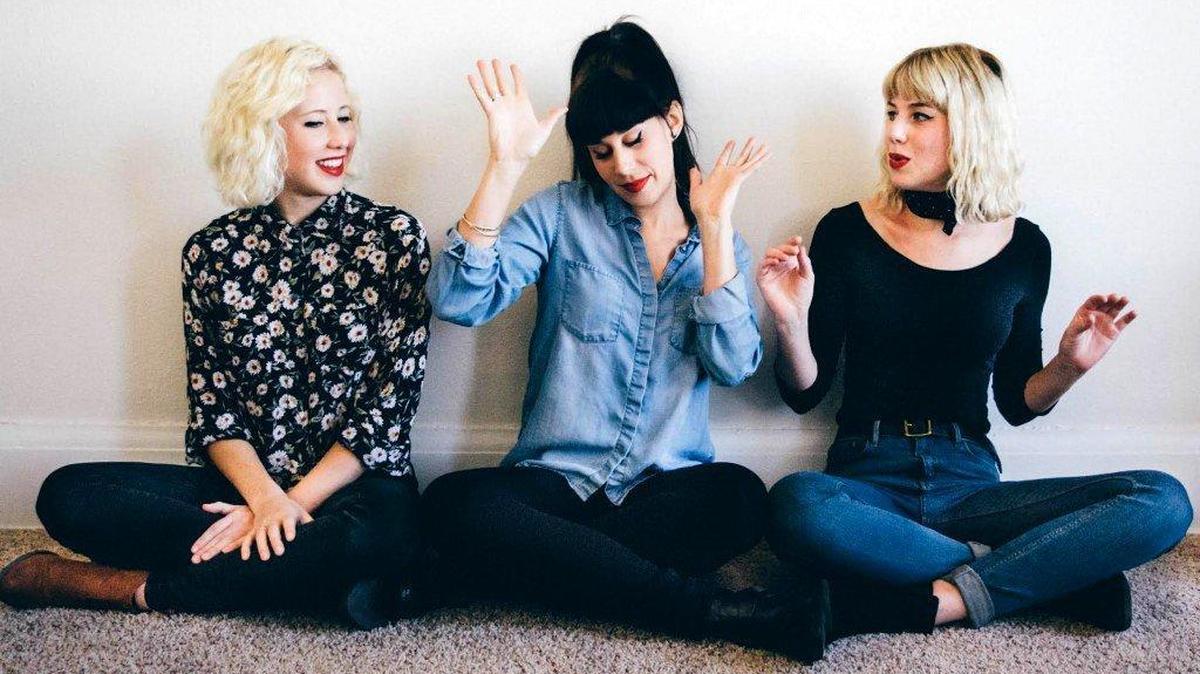 Sisters, from left, Elizabeth, Celia and Leslie Rasmussen from the band Good English.