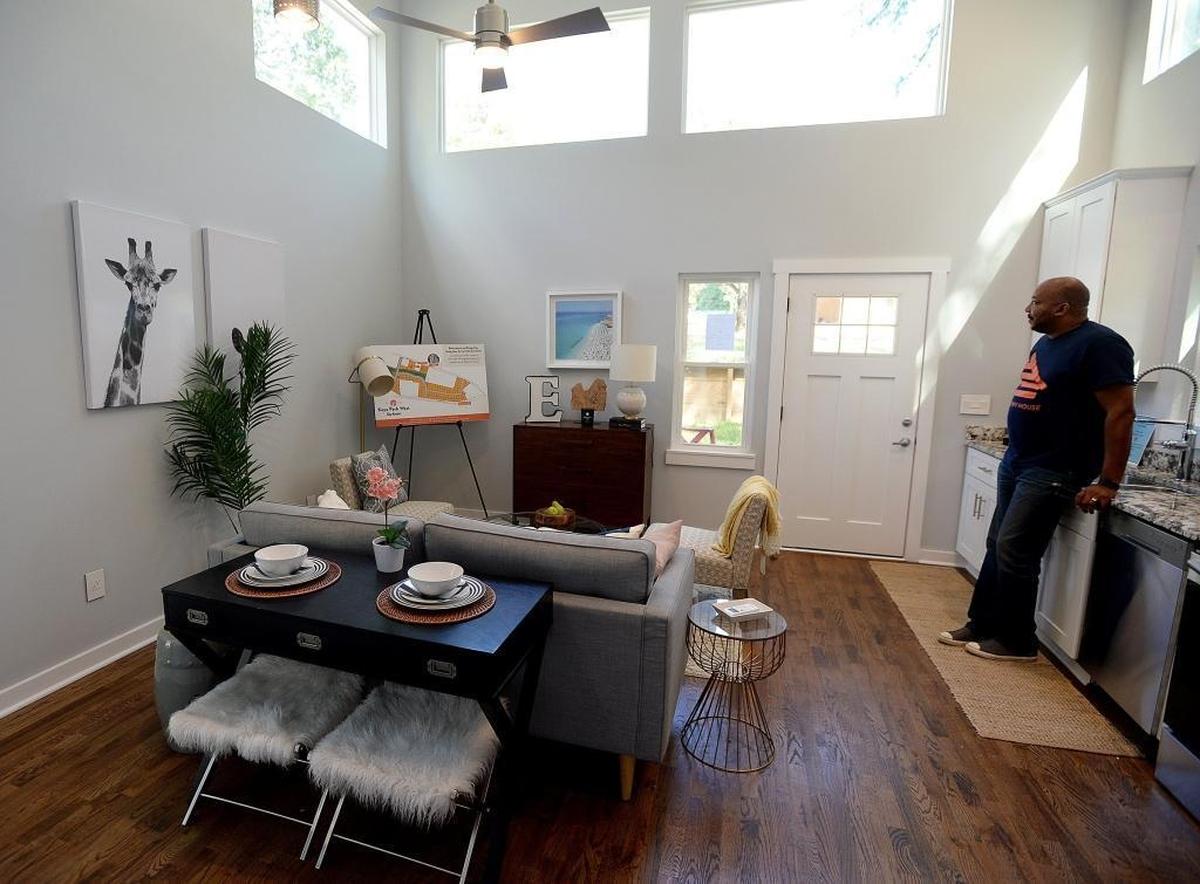Developer Kevin Young inside a tiny house at his tiny house development in Coulwood on Cathey Road.