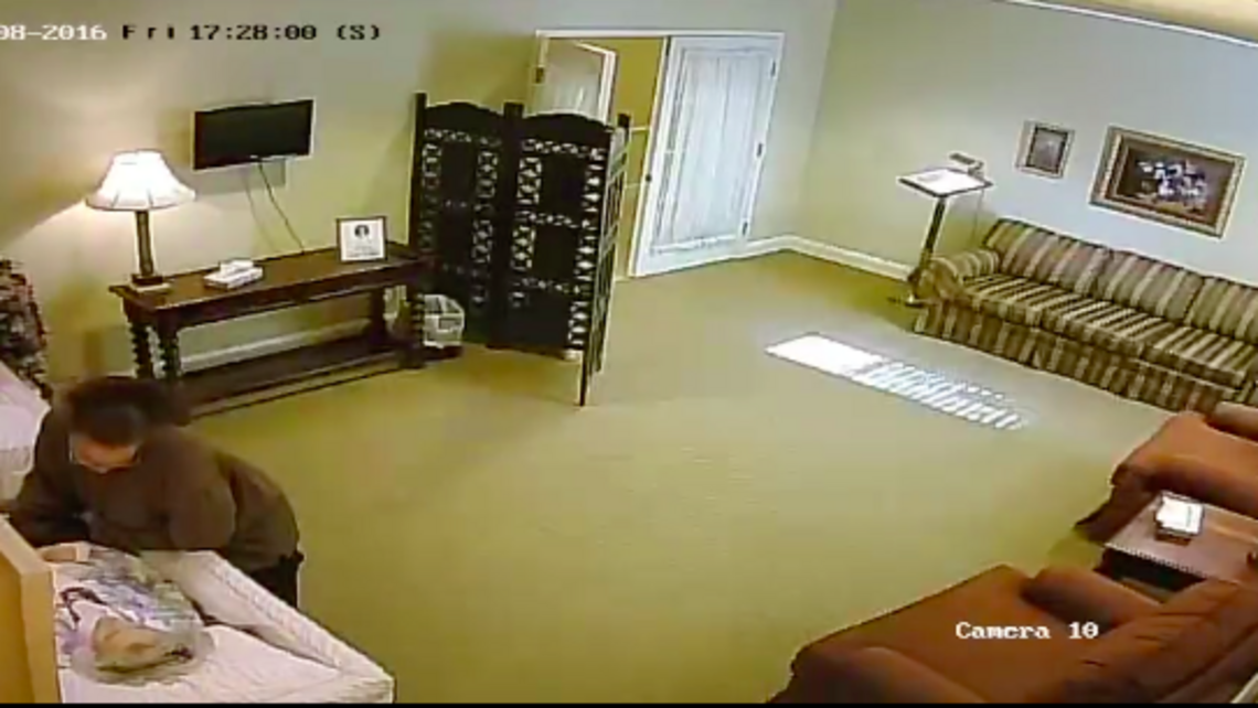 Woman charged with stealing $10 ring off dead woman in funeral home