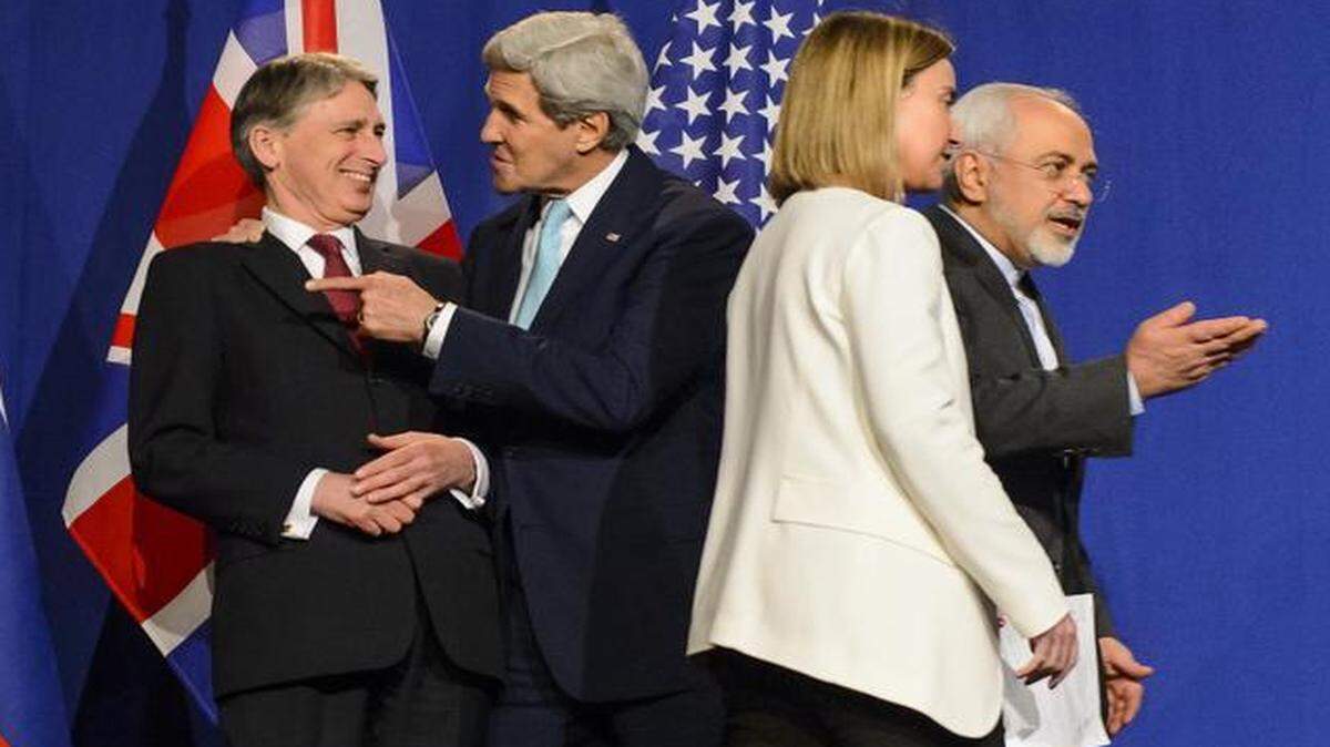 
From left, British Foreign Secretary Philip Hammond, U.S. Secretary of State John Kerry, EU official Federica Mogherini and Iranian Foreign Minister Mohammad Javad Zarif prepare for a press event after the end of a new round of nuclear talks in Lausanne, Switzerland, April 2, 2015. Back in the United States, lawmakers are having mixed reactions to the agreement. In North Carolina, Reps. Robert Pittenger and Patrick McHenry warned the administration not to eliminate sanctions without congressional consent.
