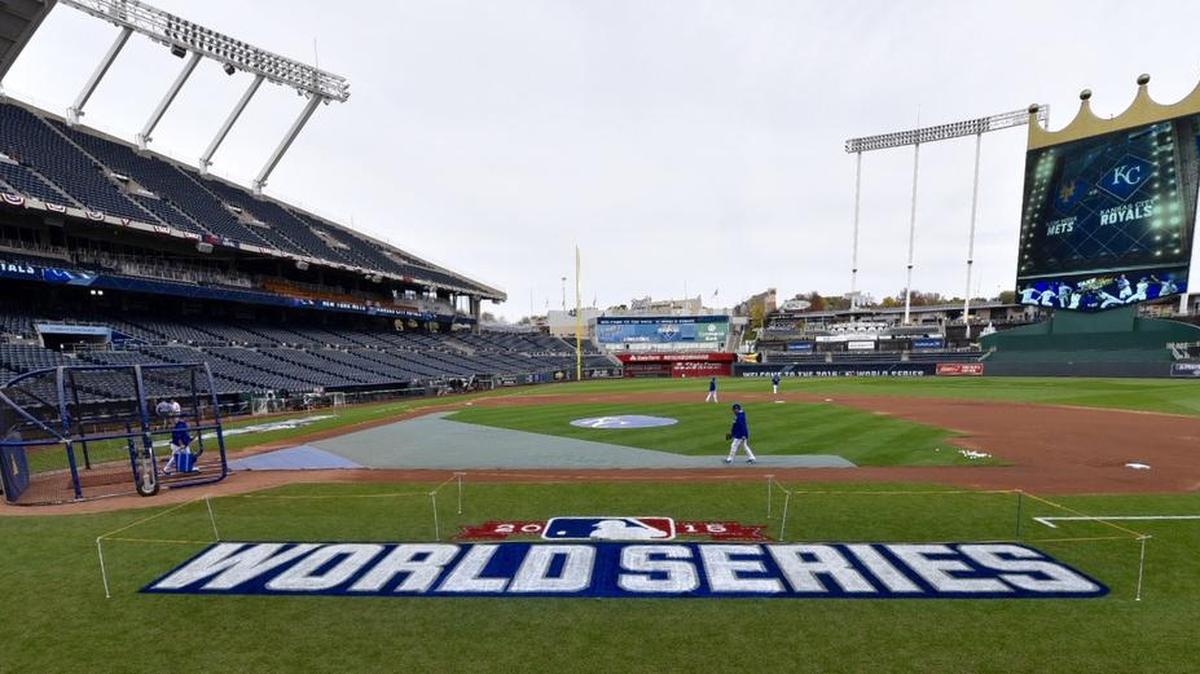 The 2015 World Series logo has been painted onto the field at Kauffman Stadium. World Series tickets are hitting a record high, one seller says.