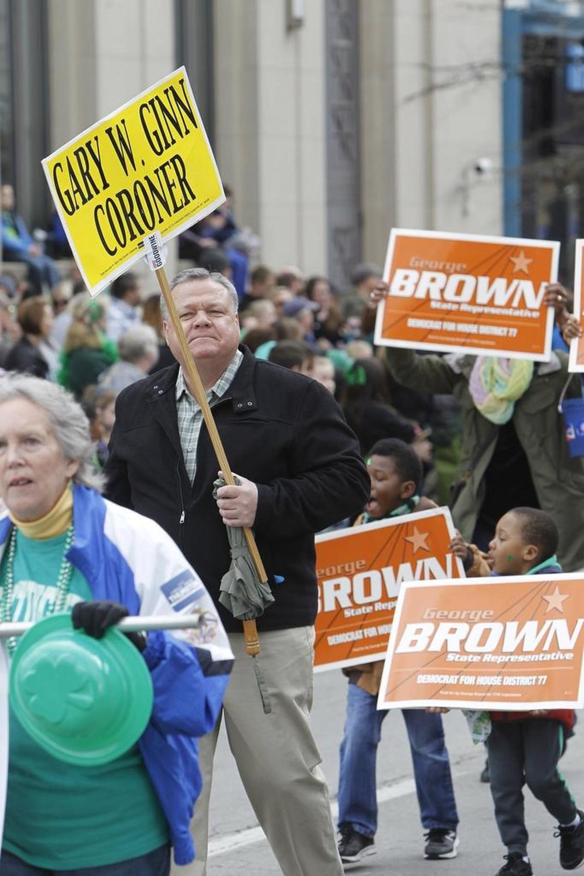 Coroner Gary Ginn marched during Lexington’s 2018 St. Patrick’s Day parade.