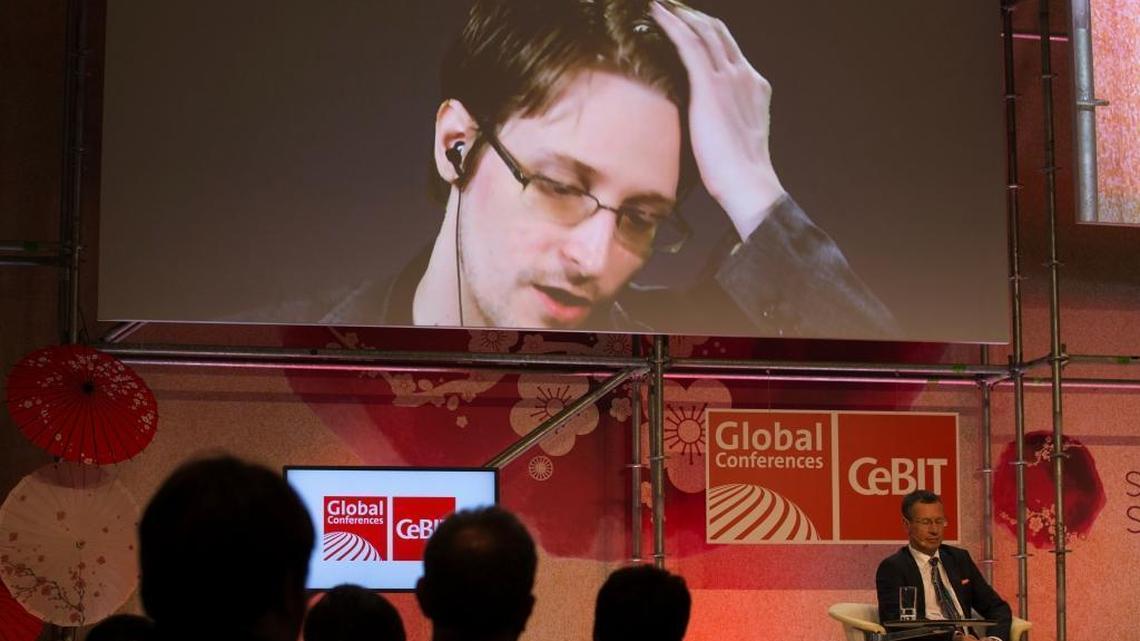 Edward Snowden speaks via the internet to a high-tech fair in Hanover, Germany, on March 21. Snowden uses video to speak to audiences all over the world, often for thousands of dollars.