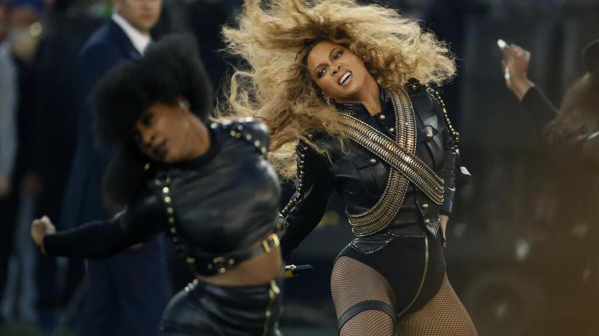 Beyonce performs during halftime of the NFL Super Bowl 50 football game in Santa Clara, Calif., Sunday, Feb. 7, 2016. Beyonce dropped more than an album on Saturday, April 23, 2016, with “Lemonade,” her dazzling new musical and visual project that speaks to the deeply personal and political.