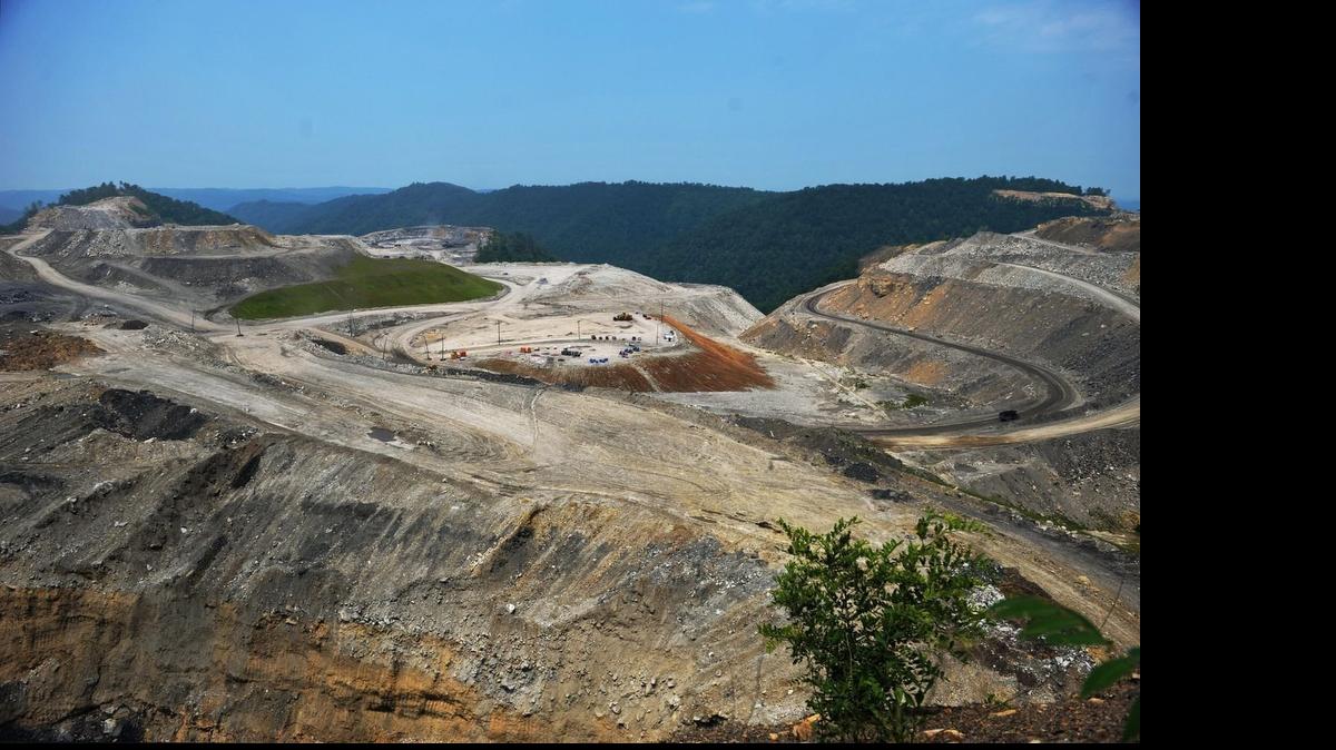 The Obama administration is imposing new measures designed to better protect streams from mountaintop removal coal mining, similar to this one on Kayford Mountain in West Virginia, a move the struggling industry calls a significant blow to jobs.