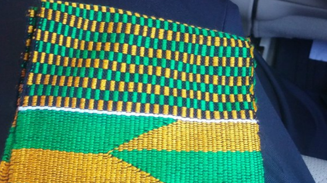 Nyree Holmes said he was escorted out of his graduation ceremony by law enforcement for wearing this kente cloth over his robes.