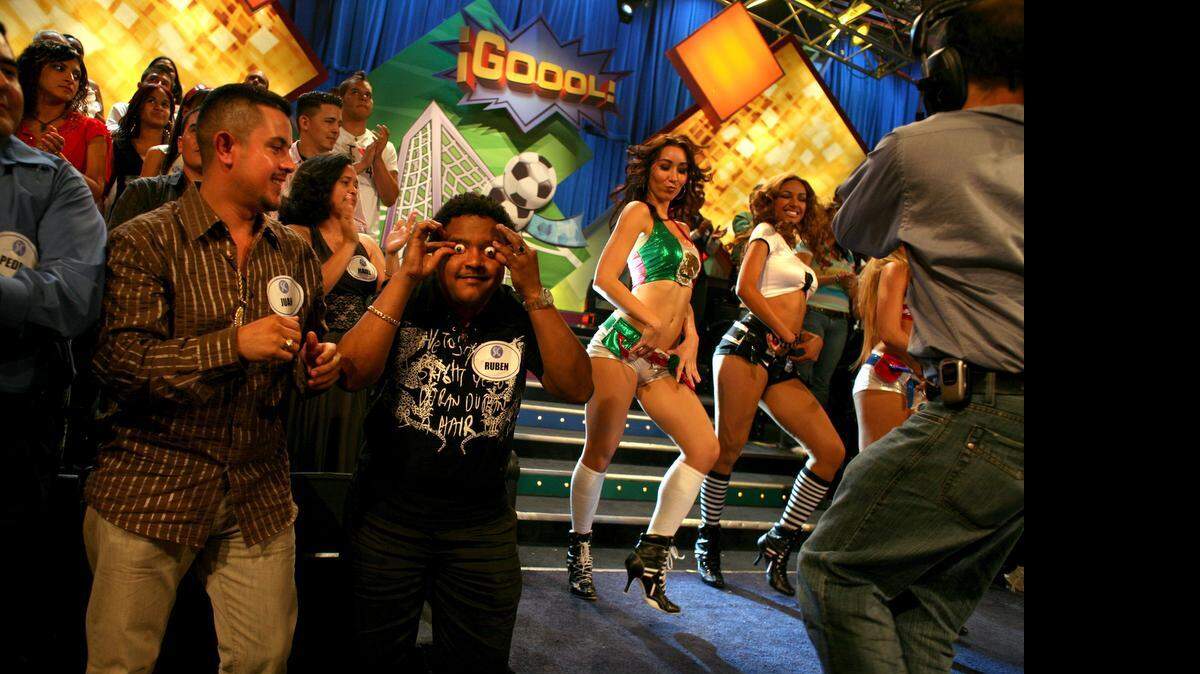 
Dancers, wide-eyed spectators and loud, thumping music are all part of the three-hour "Sabado Gigante" spectacle. This episode, taped in late June 2007, featured a soccer theme in honor of a Gold Cup game between Mexico and the U.S. 
