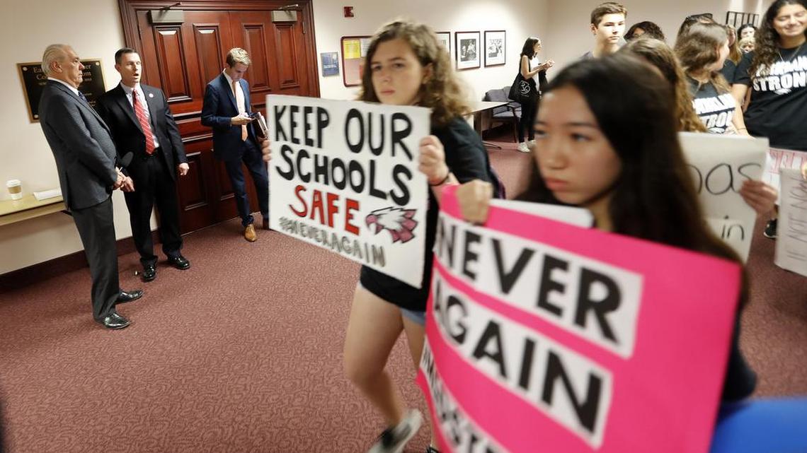 Student survivors from Marjory Stoneman Douglas High School, where moe than a dozen students and faculty were killed in a mass shooting on Wednesday, walk past the house legislative committee rom, to talk to legislators at the state Capitol, regarding gun control legislation, in Tallahassee, Fla., Wednesday, Feb. 21, 2018.