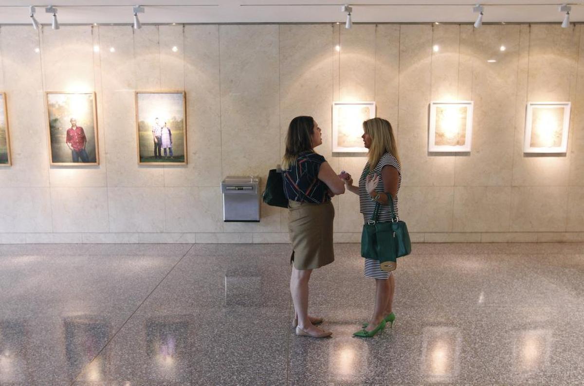 Calla Hales, director of A Preferred Women’s Health Center, left, talks with Tonya Baker Nelson, executive director of Hand of Hope Pregnancy Resource Center, in City Hall on Tuesday, June 21, 2016 after the City Council discussed whether to allow Hand of Hope to have an office next door to A Preferred Women’s Health Center.