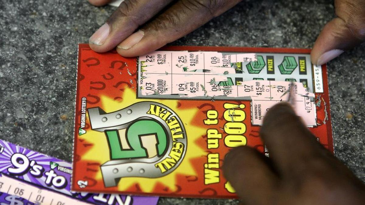 Virginia resident Edward Tanner scratches a lottery ticket at Bracey Mini Mart in Bracey, Va. Tuesday, Aug. 16, 2005. North Carolina lottery supporters thought this was the year their luck had turned. In the rush to wrap up business for the year after finally agreeing on a spending plan, all of the Senate's 21 Republicans, along with five of the chamber's majority Democrats, remained steadfast against the lottery.
