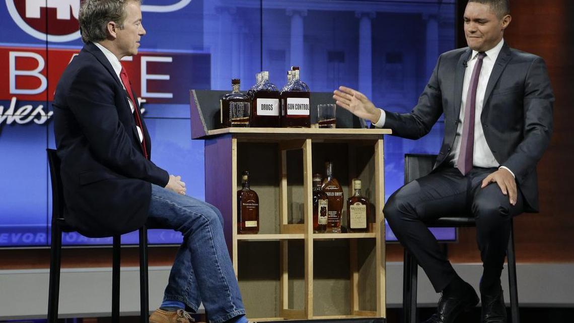 Sen. Rand Paul, R-Ky., left, talked with Trevor Noah on Wednesday after taping a segment of “The Daily Show with Trevor Noah.” Low poll numbers in Iowa and New Hampshire left him out of Thursday’s prime-time presidential debate on the Fox Business Network.